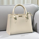 Bolsa Feminina Santorini Handbag com Alça transversal removível para ombro.