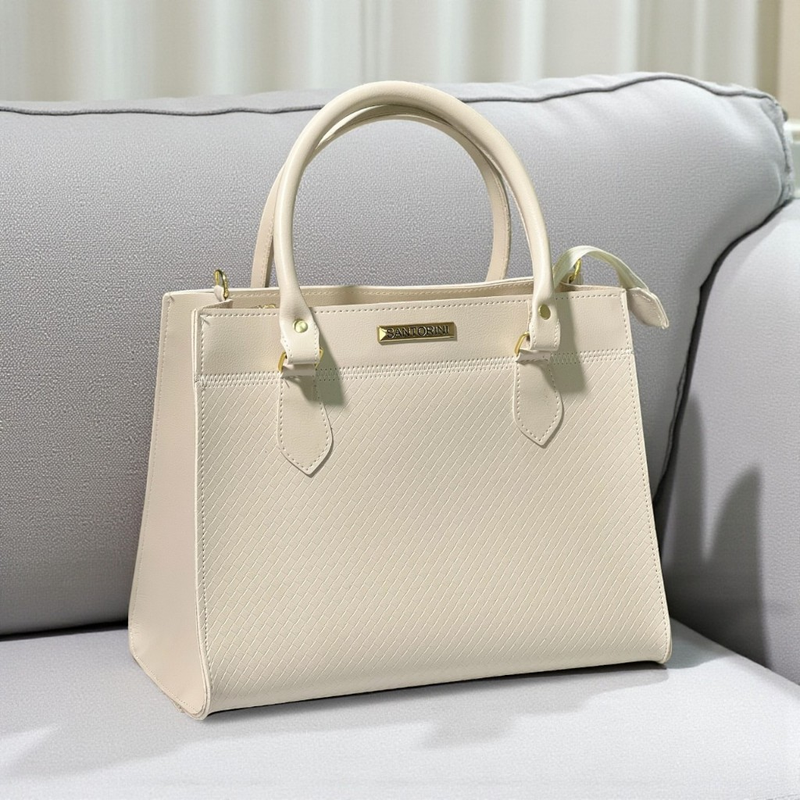 Bolsa Feminina Santorini Handbag com Alça transversal removível para ombro.