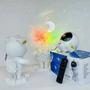Luminária e Projetor De Estrelas e Lua Astronauta e Caixa de Som Bluetooth